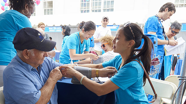 Community members receiving health services